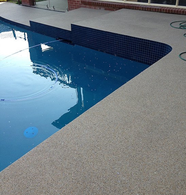 Pebble Mix paving around pool by Express Floors Mornington Peninsula.